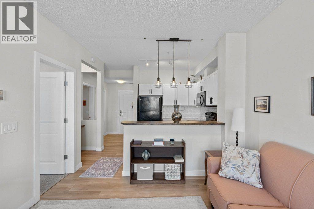 Single Family at 201 Sunset Drive, Cochrane, Alberta - Photo 7 - RE/MAX Garden City Realty