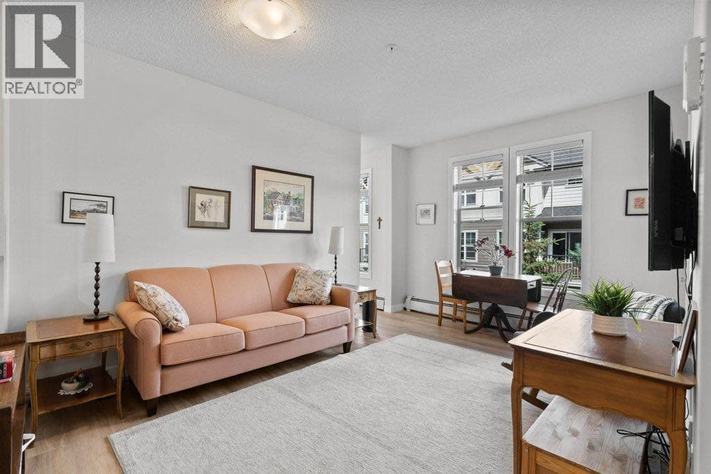 Single Family at 201 Sunset Drive, Cochrane, Alberta - Photo 6 - RE/MAX Garden City Realty