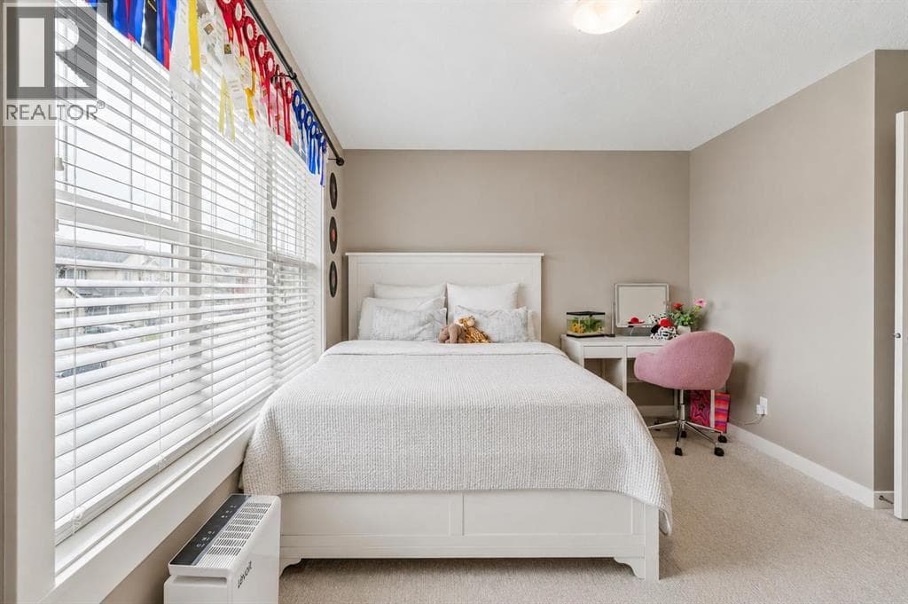 Single Family at 144 Sunrise View, Cochrane, Alberta - Photo 10 - RE/MAX Garden City Realty
