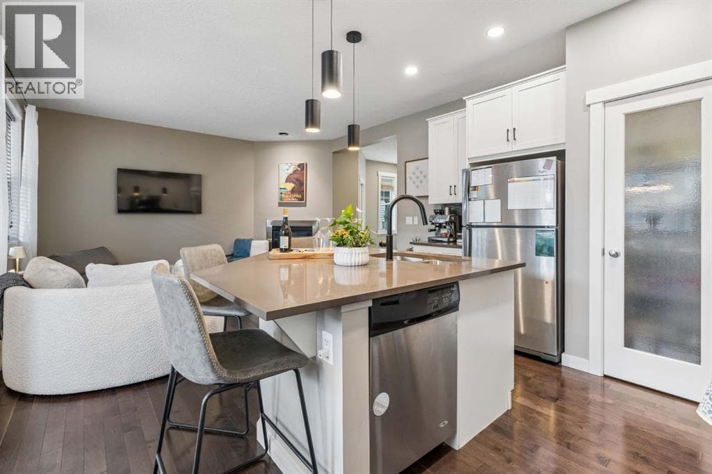 Single Family at 144 Sunrise View, Cochrane, Alberta - Photo 4 - RE/MAX Garden City Realty