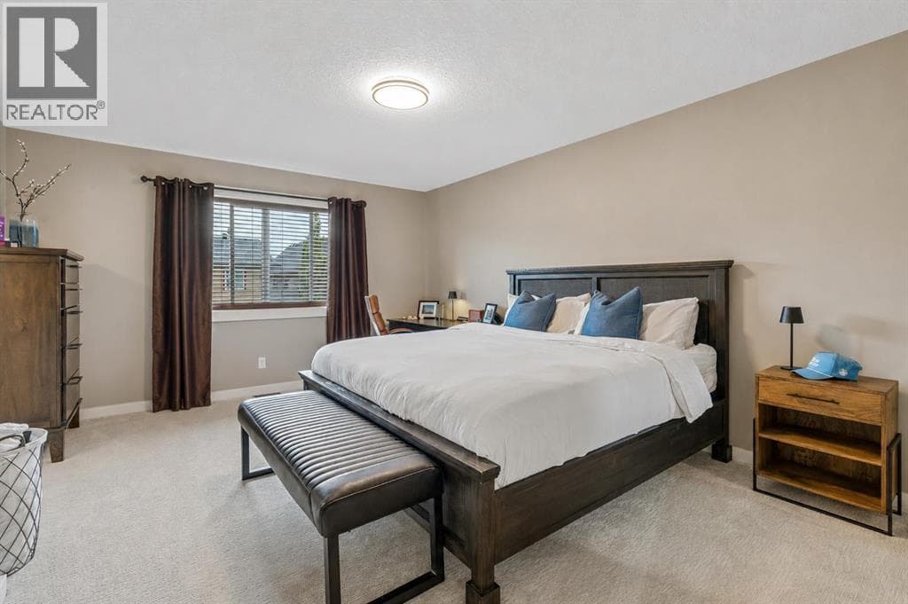 Single Family at 144 Sunrise View, Cochrane, Alberta - Photo 7 - RE/MAX Garden City Realty
