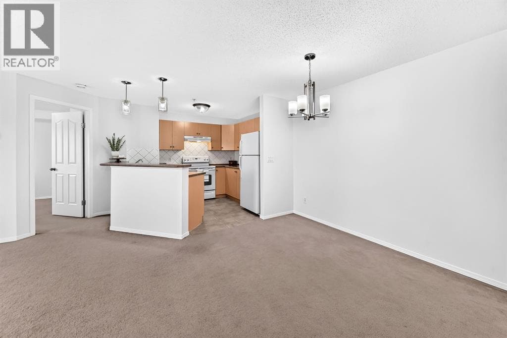 Single Family at 505 Railway Street, Cochrane, Alberta - Photo 2 - RE/MAX Garden City Realty