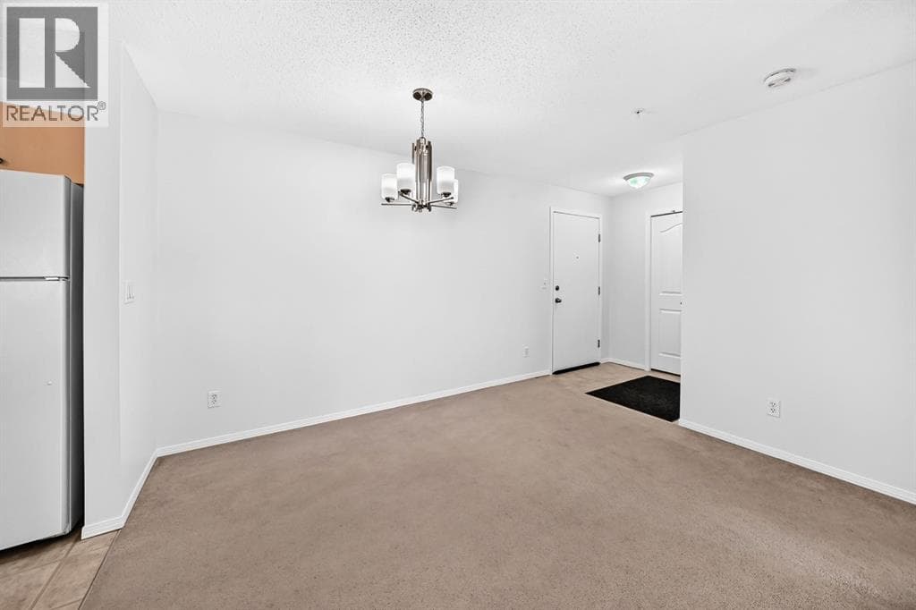 Single Family at 505 Railway Street, Cochrane, Alberta - Photo 6 - RE/MAX Garden City Realty