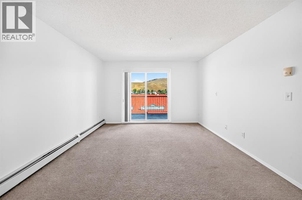 Single Family at 505 Railway Street, Cochrane, Alberta - Photo 8 - RE/MAX Garden City Realty