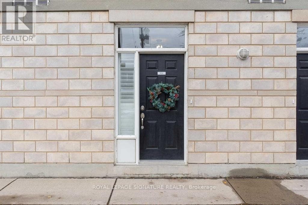 Single Family at 102- 3400 Lake Shore Boulevard, Toronto (Long Branch), Ontario - Photo 2 - RE/MAX Garden City Realty