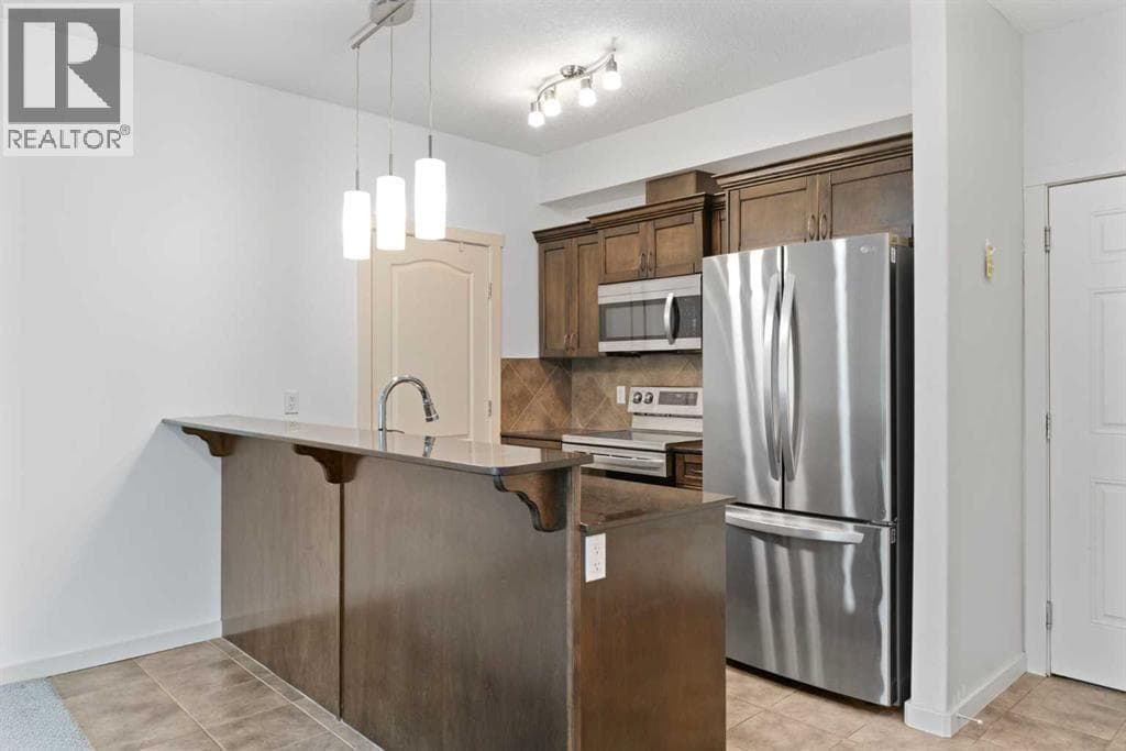 Single Family at 141 Mountain Street, Cochrane, Alberta - Photo 3 - RE/MAX Garden City Realty