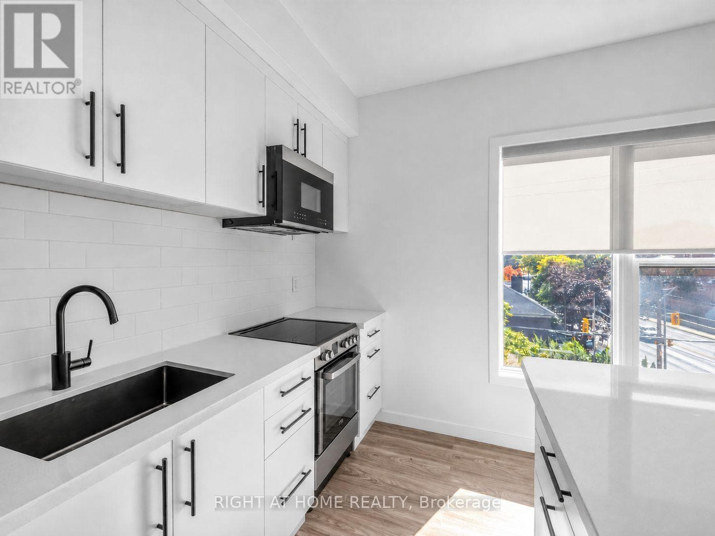 Single Family at 9- 148 Glenlake Avenue, Toronto (High Park North), Ontario - Photo 4 - RE/MAX Garden City Realty