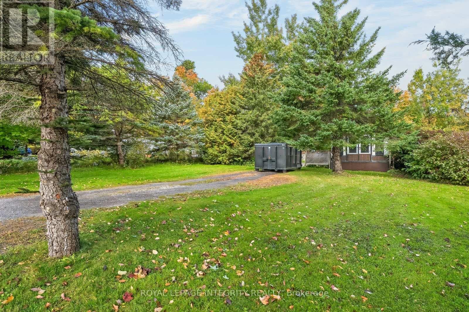 Single Family at 32- 7481 Mitch Owens Road, Ottawa, Ontario - Photo 2 - RE/MAX Garden City Realty