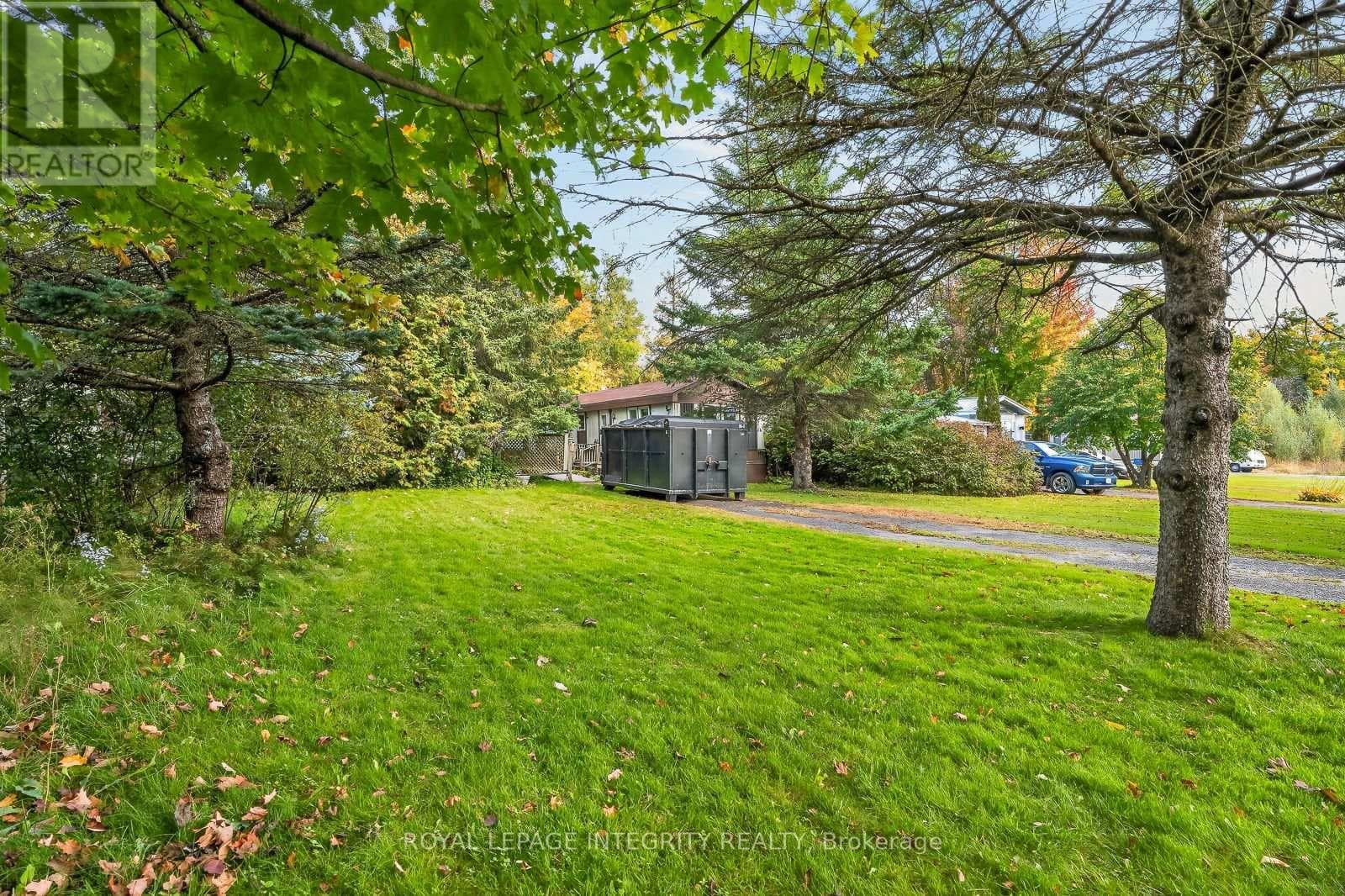 Single Family at 32- 7481 Mitch Owens Road, Ottawa, Ontario - Photo 3 - RE/MAX Garden City Realty
