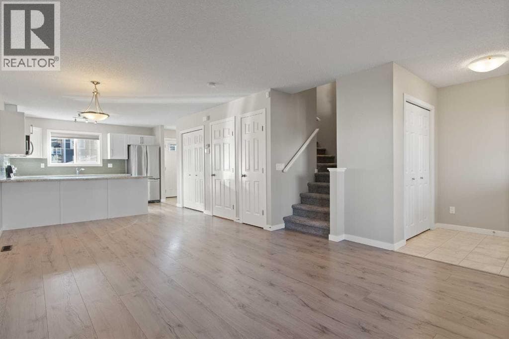 Single Family at 276 Sunset Road, Cochrane, Alberta - Photo 9 - RE/MAX Garden City Realty