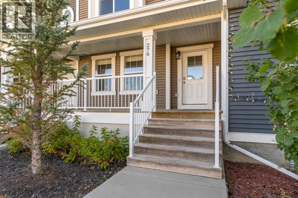 Single Family at 276 Sunset Road, Cochrane, Alberta - Photo 3 - RE/MAX Garden City Realty
