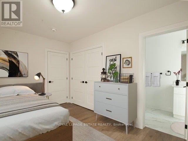 Multi-family at Upper- 22 Wineva Avenue, Toronto (The Beaches), Ontario - Photo 2 - RE/MAX Garden City Realty