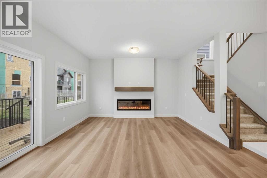 Single Family at 117 Topaz Place, Cochrane, Alberta - Photo 8 - RE/MAX Garden City Realty