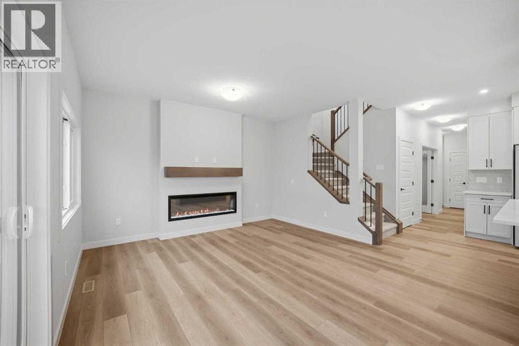 Single Family at 117 Topaz Place, Cochrane, Alberta - Photo 9 - RE/MAX Garden City Realty