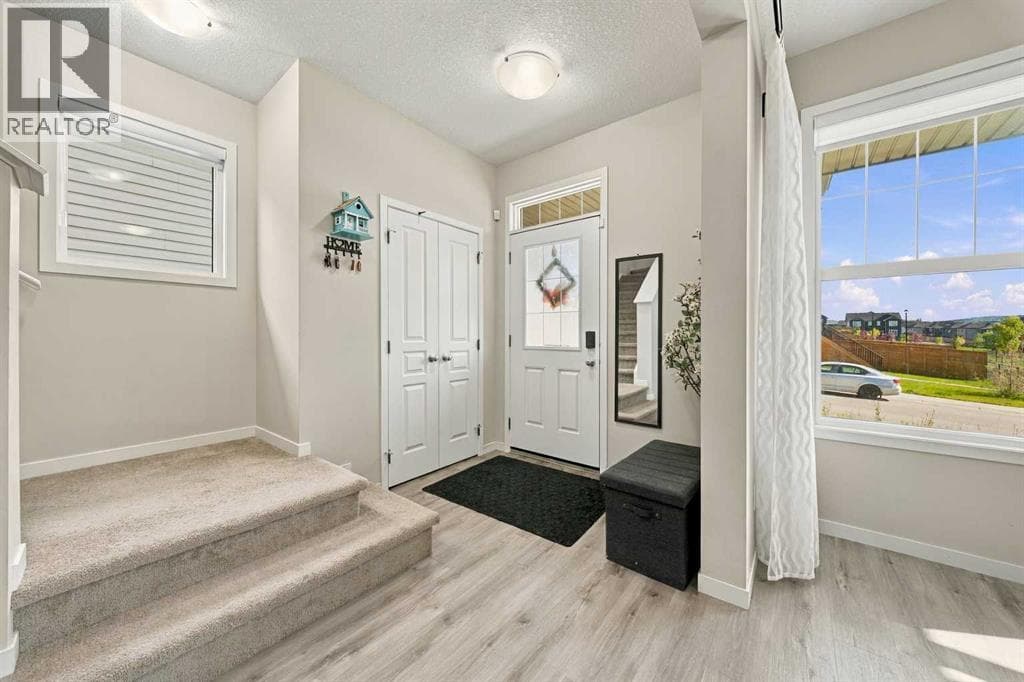 Single Family at 35 Heritage Rise, Cochrane, Alberta - Photo 2 - RE/MAX Garden City Realty