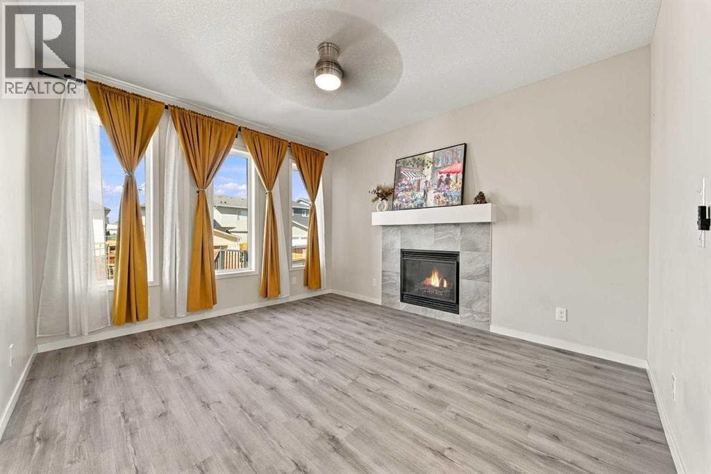 Single Family at 35 Heritage Rise, Cochrane, Alberta - Photo 7 - RE/MAX Garden City Realty