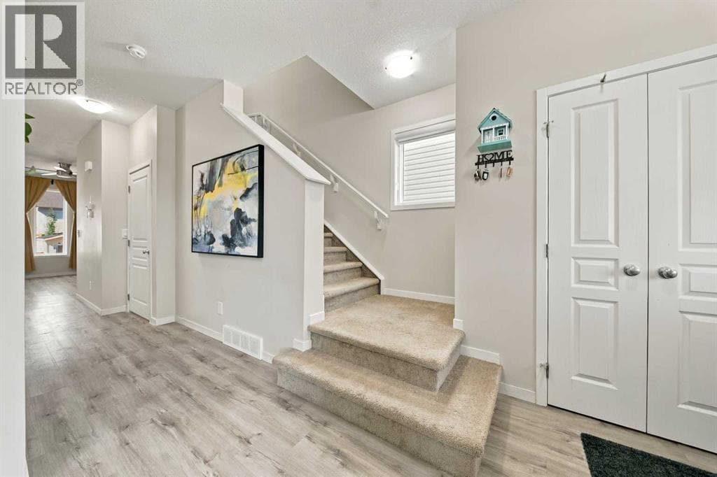 Single Family at 35 Heritage Rise, Cochrane, Alberta - Photo 5 - RE/MAX Garden City Realty