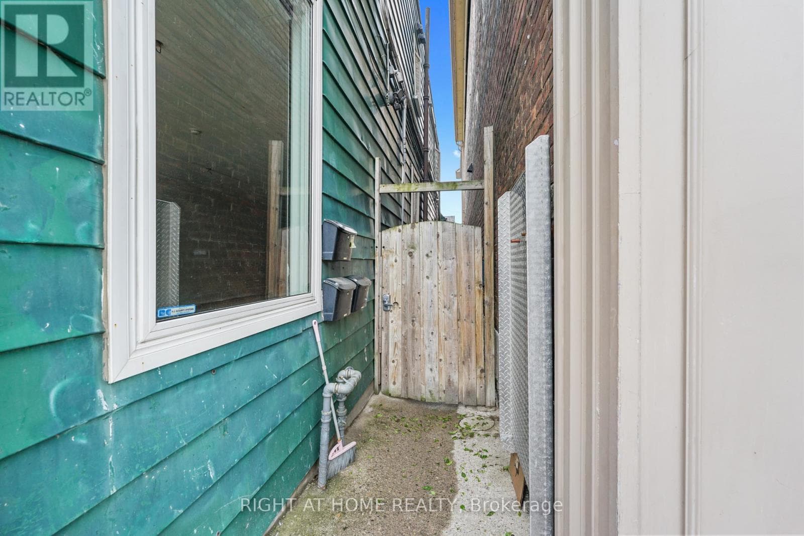 Single Family at 2- 2207 Queen Street, Toronto (The Beaches), Ontario - Photo 2 - RE/MAX Garden City Realty