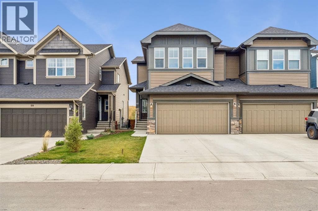 Single Family at 63 Fireside Crescent, Cochrane, Alberta - Photo 2 - RE/MAX Garden City Realty