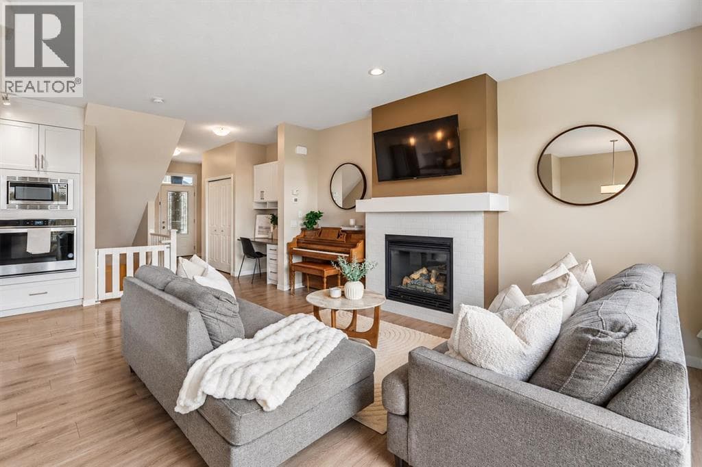 Single Family at 63 Fireside Crescent, Cochrane, Alberta - Photo 4 - RE/MAX Garden City Realty