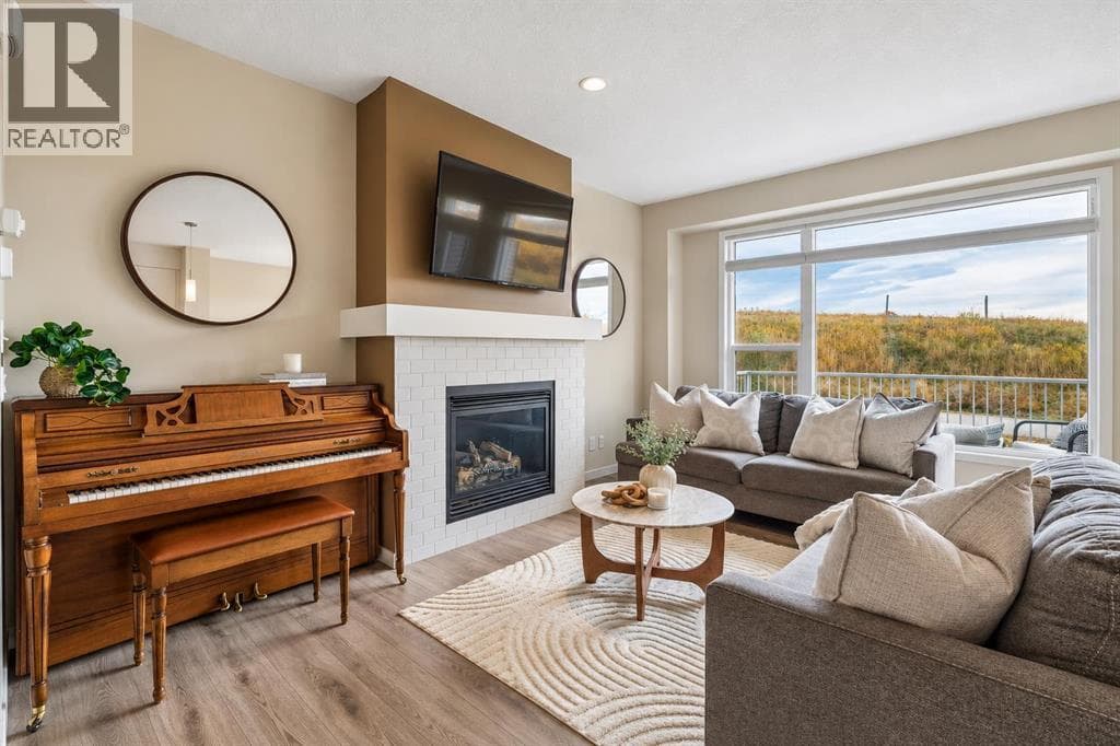 Single Family at 63 Fireside Crescent, Cochrane, Alberta - Photo 3 - RE/MAX Garden City Realty