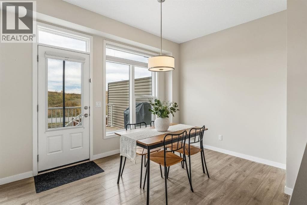 Single Family at 63 Fireside Crescent, Cochrane, Alberta - Photo 7 - RE/MAX Garden City Realty