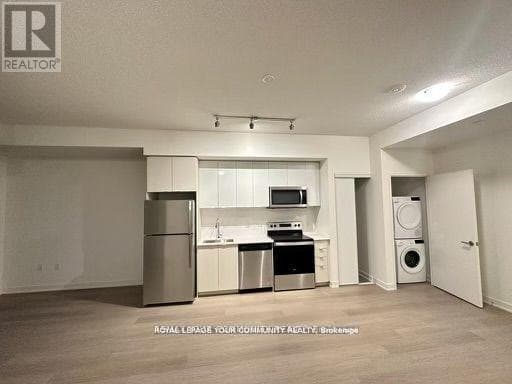 Single Family at 3203- 59 Annie Craig Drive, Toronto (Mimico), Ontario - Photo 3 - RE/MAX Garden City Realty