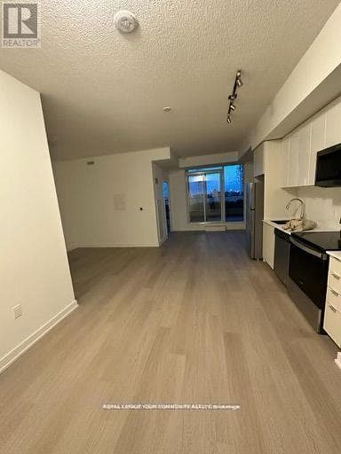 Single Family at 3203- 59 Annie Craig Drive, Toronto (Mimico), Ontario - Photo 5 - RE/MAX Garden City Realty