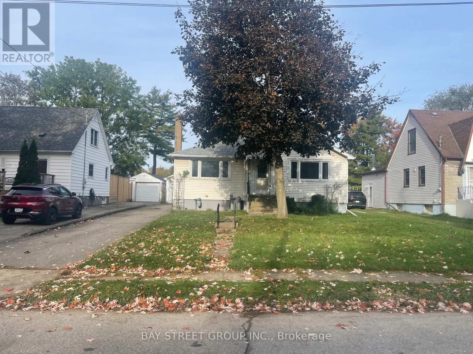 Single Family at 5137 ONTARIO Avenue, Niagara Falls (Downtown), Ontario - Photo 2 - RE/MAX Garden City Realty