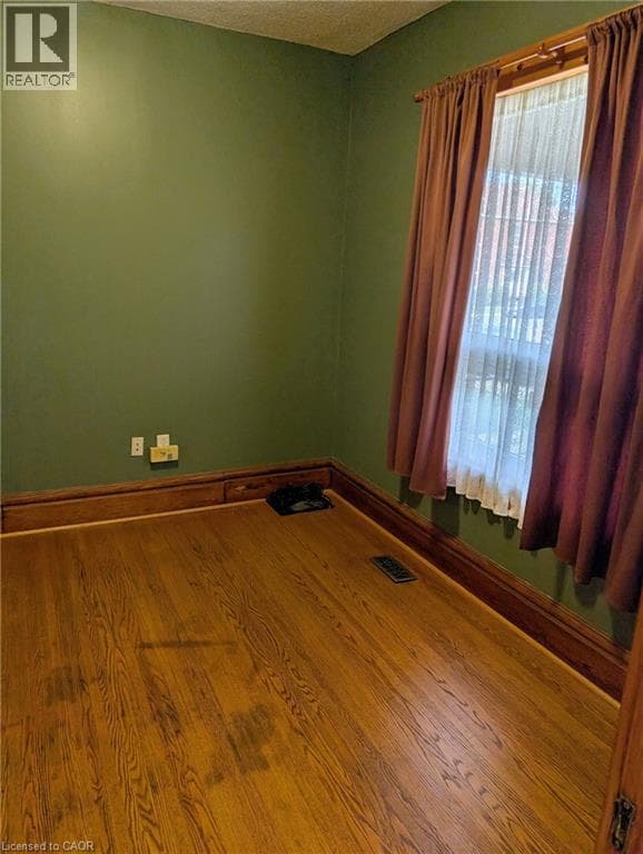 Single Family at 61 BARNESDALE Avenue, Hamilton, Ontario - Photo 7 - RE/MAX Garden City Realty
