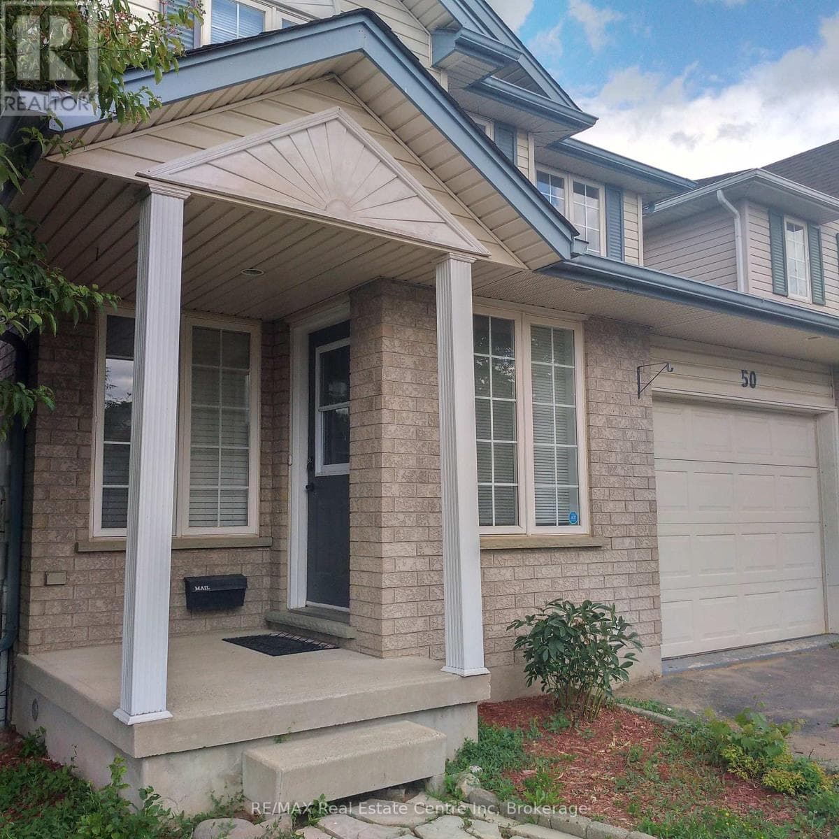 Single Family at 50 Hagan Avenue, Guelph (Grange Road), Ontario - Photo 1 - RE/MAX Garden City Realty