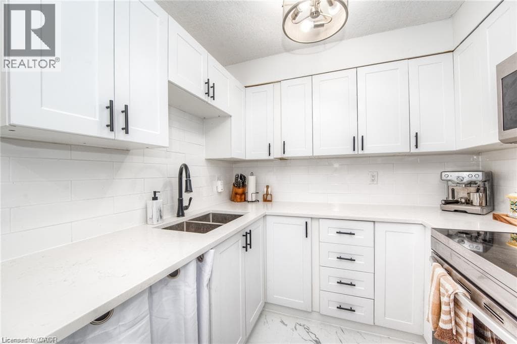 Single Family at 402- 225 HARVARD Place, Waterloo, Ontario - Photo 1 - RE/MAX Garden City Realty