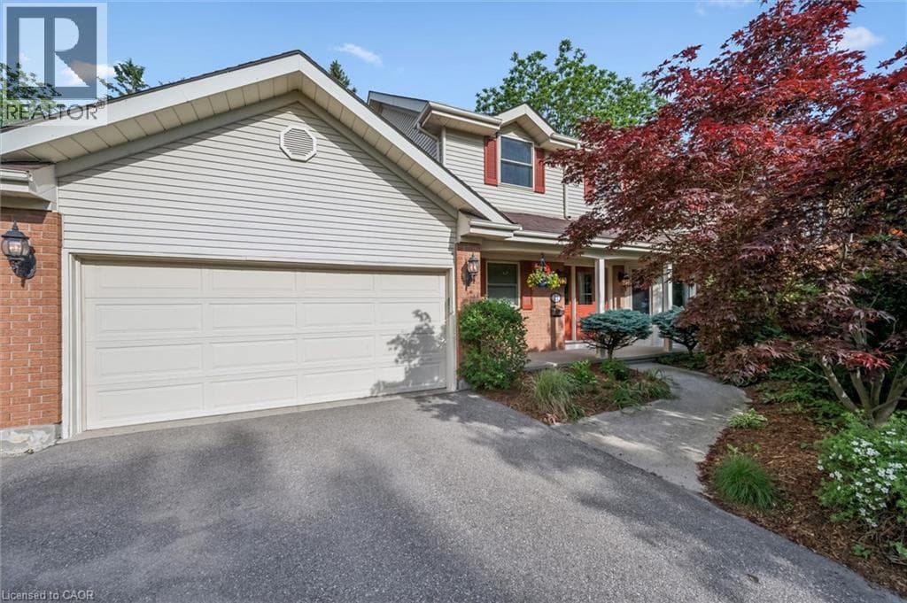 Single Family at 21 TINATAWA Court, Kitchener, Ontario - Photo 1 - RE/MAX Garden City Realty