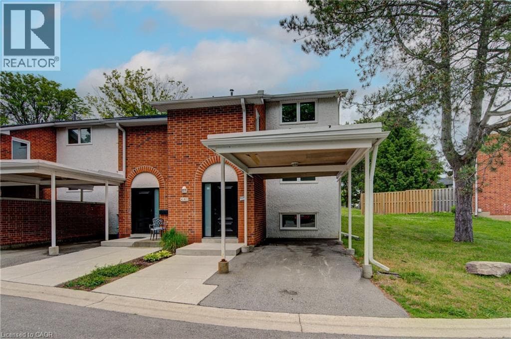 Single Family at 4- 417 KEATS Way, Waterloo, Ontario - Photo 1 - RE/MAX Garden City Realty